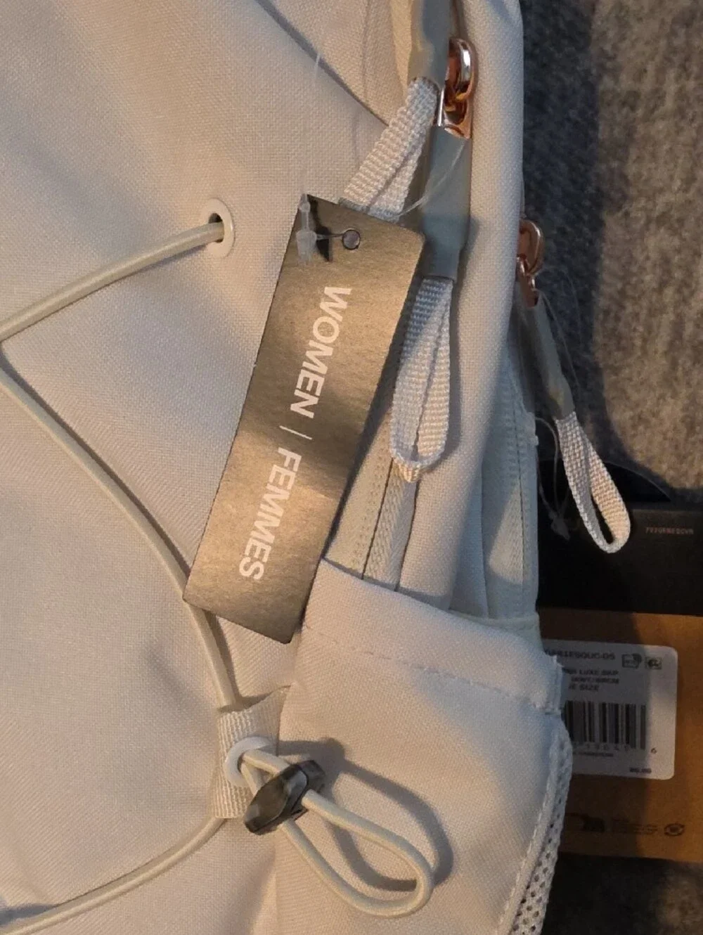 The North Face Jester Luxe Backpack - Cream/Light Beige with Rose Gold Accents.